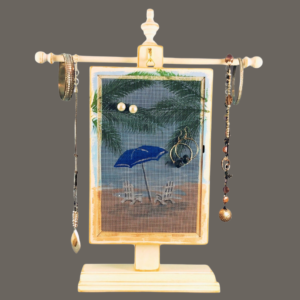 Hand-painted Earring Holder with Beach Umbrella Design — white distressed wood frame with fiberglass screen earring display area hanging on matching necklace stand. Handmade in Michigan.