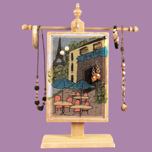 Hand-painted Earring Holder with Bistro Design — weathered gray solid wood frame with fiberglass screen earring display area hanging on matching necklace stand. Handmade in Michigan.