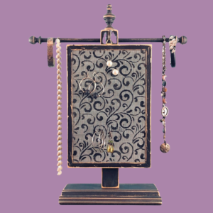 Hand-painted Earring Holder with Curlz Design — solid wood frame with fiberglass screen earring display area hanging on necklace stand. Handmade in Michigan.