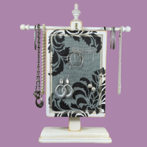Hand-painted Earring Holder with Damask Design — solid wood frame with fiberglass screen earring display area hanging on necklace stand. Handmade in Michigan.