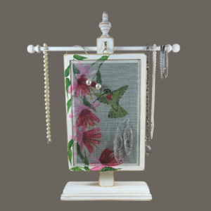 Hand-painted Earring Holder with Hummingbirds Design — white distressed wood frame with fiberglass screen earring display area hanging on matching necklace stand. Handmade in Michigan.