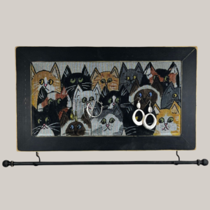 Hand-painted jewelry organizer - Studio Series Gallery of Cats Design - on a black distressed solid wood frame and a decorative fiberglass screen as the earring holder surface. A matching jewelry bar hangs from the frame.