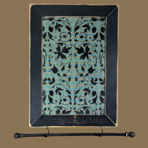 Hand-painted jewelry organizer - Portrait Series Aida Design - on a black distressed solid wood frame and a decorative fiberglass screen as the earring holder surface. A matching jewelry bar hangs from the frame.