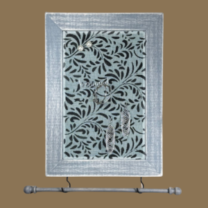 Hand-painted jewelry organizer - Portrait Series Twigs Design - on a weathered gray solid wood frame and a decorative fiberglass screen as the earring holder surface. A matching jewelry bar hangs from the frame.