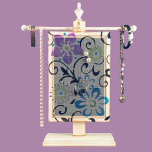 Hand-painted Earring Holder with Floral Scroll Design — white distressed solid wood frame with fiberglass screen earring display area hanging on necklace stand. Handmade in Michigan.